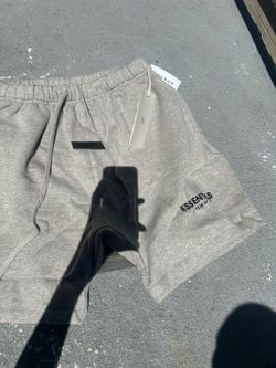 Fear of God ESSENTIALS shorts — clean grey