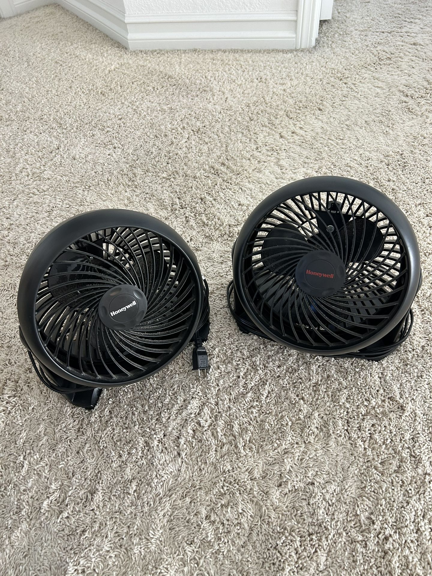 2 Almost New Fans Honeywell Turbo For $25.00
