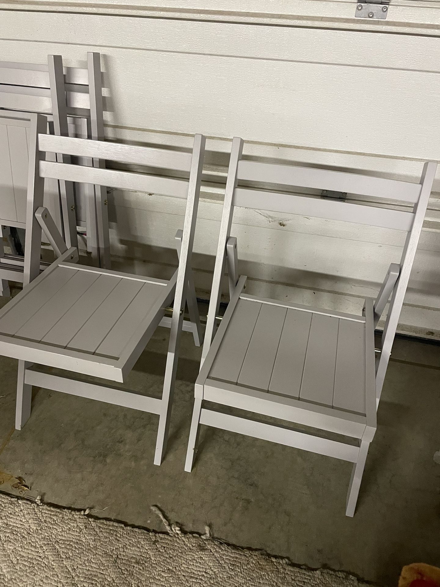 4 Folding Chairs 