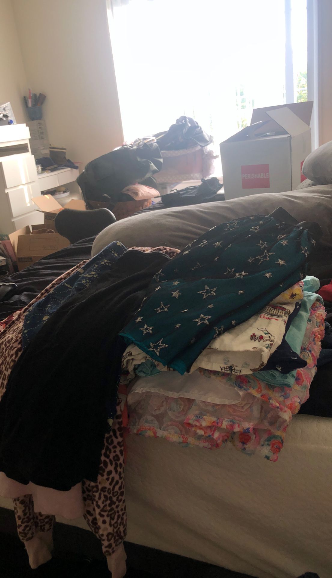 Pile of girls clothes