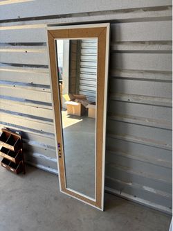 Full Length Cork Board Mirror Large full-length wall mirror with cork board frame.