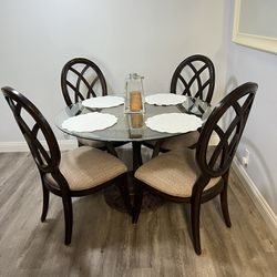Glass Table With Four Cushion Brown Chairs (UTC Area)