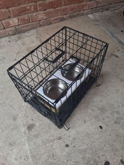 Dog Kennel (small) & Bowls $45 Dlls.