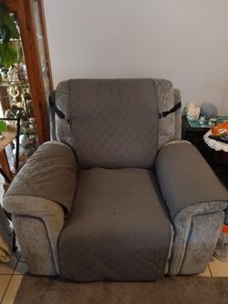 Recliner... Grey color...Electric with USB ..Like new..no stains tears,etc..no issues..less than 6 months old! Paid $500 +tax @ Bobs furniture...Check