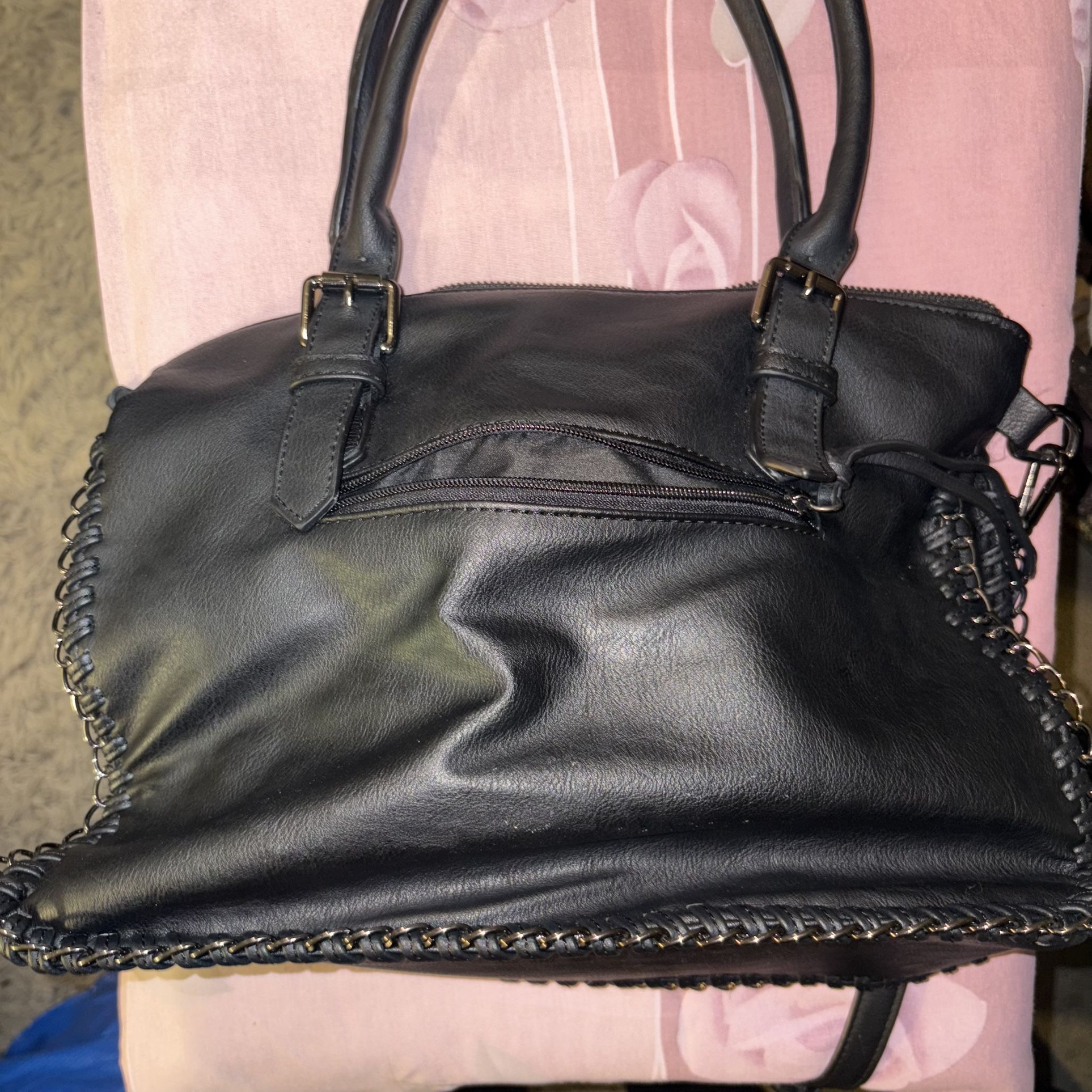 Black leather shoulder bag with chain detail 