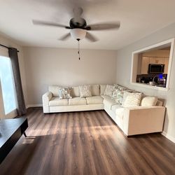 Cream L-shaped Sectional Sofa w/ Throw Pillows