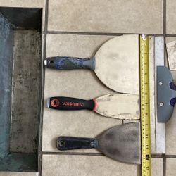 TAPING OR CAULKING TOOLS