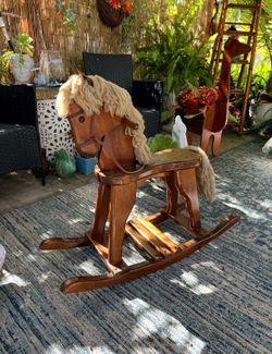 Vintage child’s wooden rocking horse