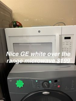 Nice GE White the range microwave