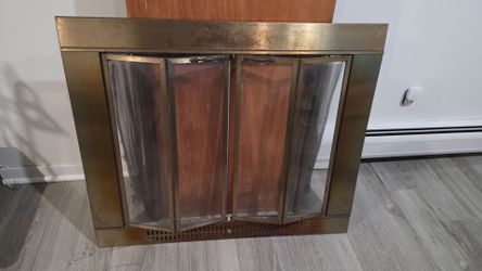 Fireplace glass with metal mesh