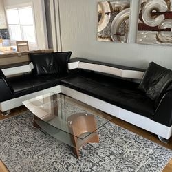 Black and white all leather couch 