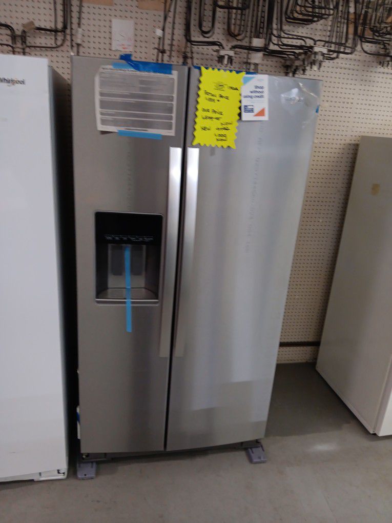 Brand New Whirlpool Refrigerator $700. 1 Year Warranty 