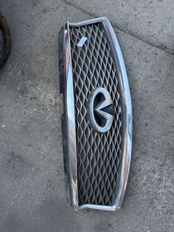 2016-2020 Infiniti Q56   Front Grille with Camera OEM