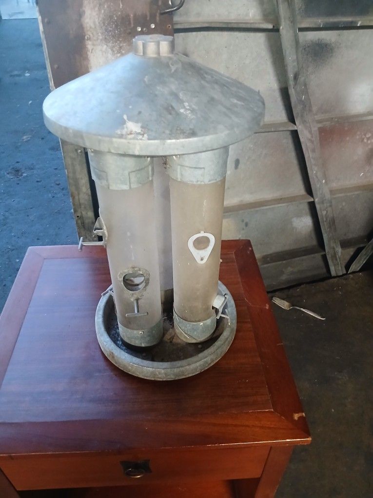 A bird feeder, good condition.