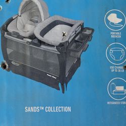 Graco Pack And Play Snuggle Suite Sand Collection