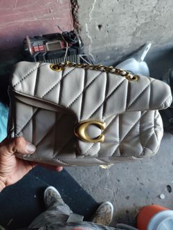Coach purse normally 200 too 400 used asking  90