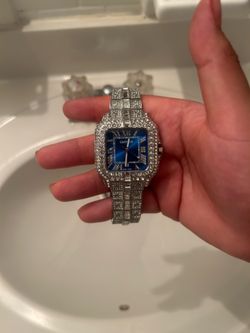 Blue face iced out cartier