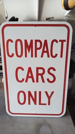 Compact cars only sign