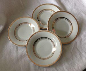 Set of Saucers with Gold Rim