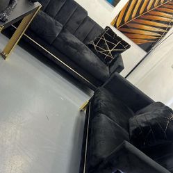 Selling an elegant sofa and loveseat, brand new in their boxes. Financing available.