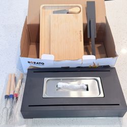 Selling a Rozato tabletop fireplace (new).