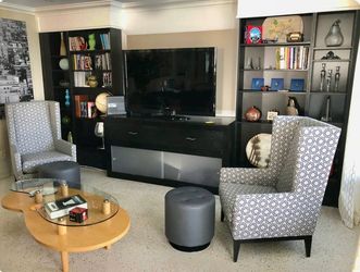 Pair of high-back American Leather McCartney Wing Chairs with Jonathan Adler fabric