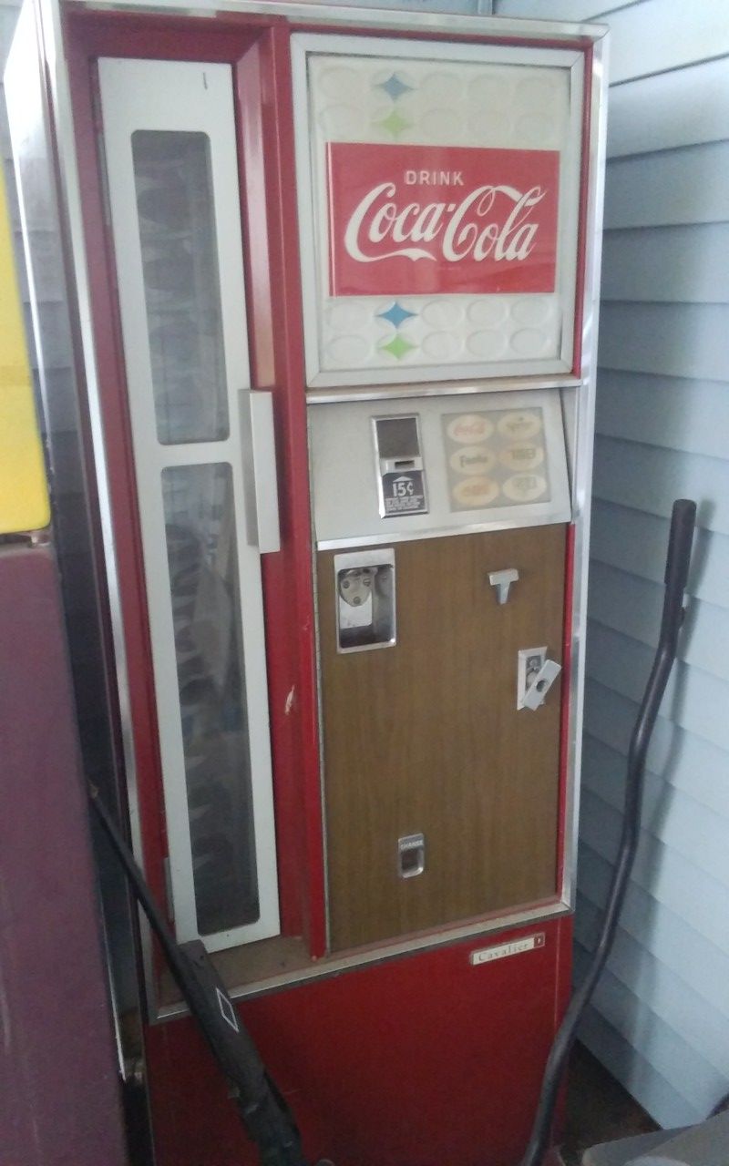 Vintage Coke bottle machine, runs but does need some work. $700.00 obo