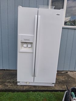 Whirlpool Side-by-Side Refrigerator with Ice Dispenser