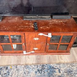 Tv stand well used still works great and fit a 65” tv