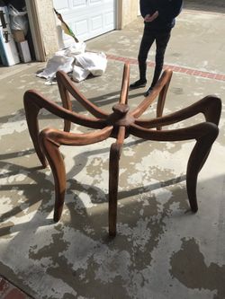 Designer wood spider table with glass