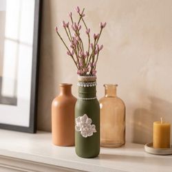 Green Decorative Vase with Floral Embellishment