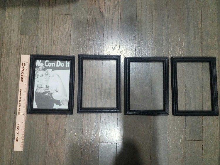Four Small Black Picture Frames