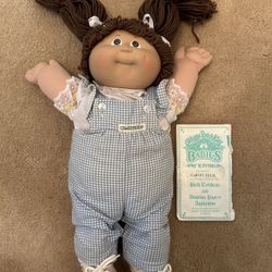 Cabbage Patch Dolls with Birth Certificates and Adoption Papers 