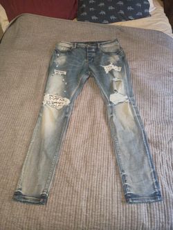 Amiri CrossBones Distressed Denim 