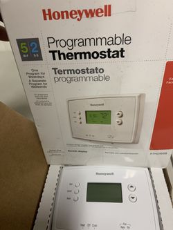 Thermostat nuevo en su caja
