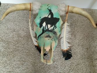 Remington like painting on cowshead