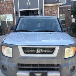 2003  Honda element Dx sport utility 4 door 4 cylinder VTEC 2.4 liter automatic 4WD 209k miles runs and drives good clean colorado title