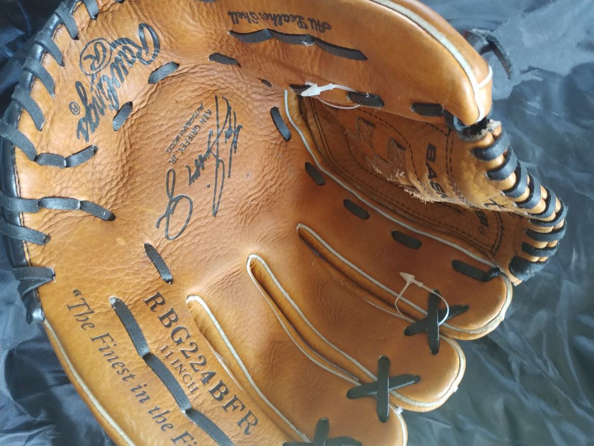 Rawlings baseball glove. All leather she'll. 11 inch. With Ken Griffey, Jr Autograph