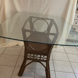 Glass And Rattan  Dining Table  