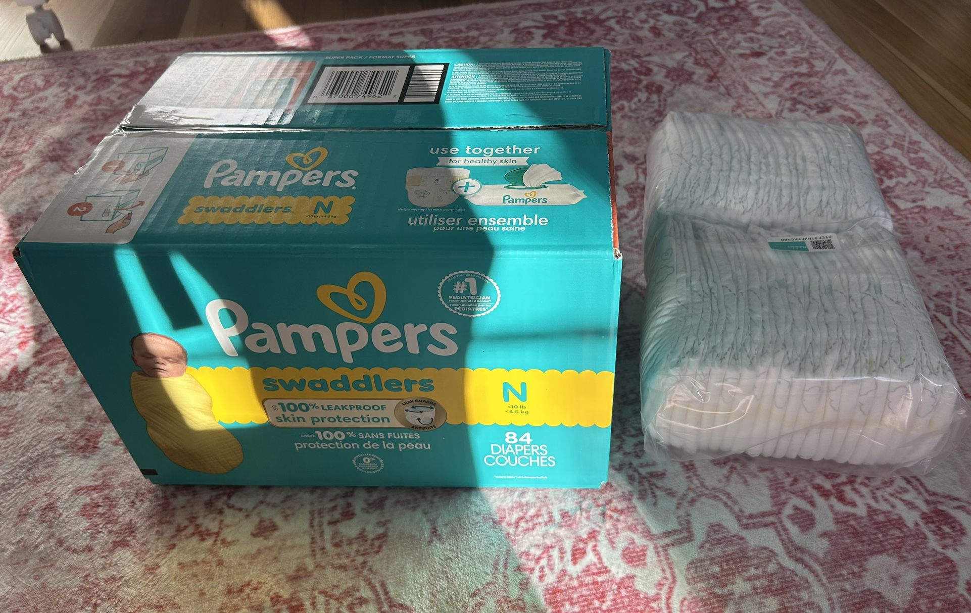 Brand New 126 Count Newborn Pamper Swaddled