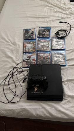 PlayStation 4 (PS4) with games