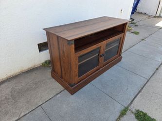 Tv stand, 26"H. 43"W. 17.5"D.