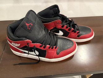 Air Jordan 1 Mids in a black/red/white colorway, men’s 9.5