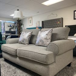 Fusion Furniture Loveseat with Rolled Arms and Reversible Cushions $129.99