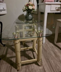 2 Cream and gold glass top side tables