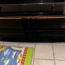 Modern Glass & Wood TV Stand (Fits up to 65”)
