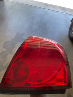 04-06 Nissan Sentra left rear tail light assembly