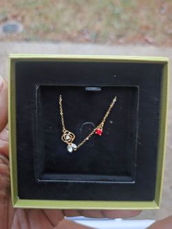 Gold-Tone Chain Necklace with Flower and Crystal Charms