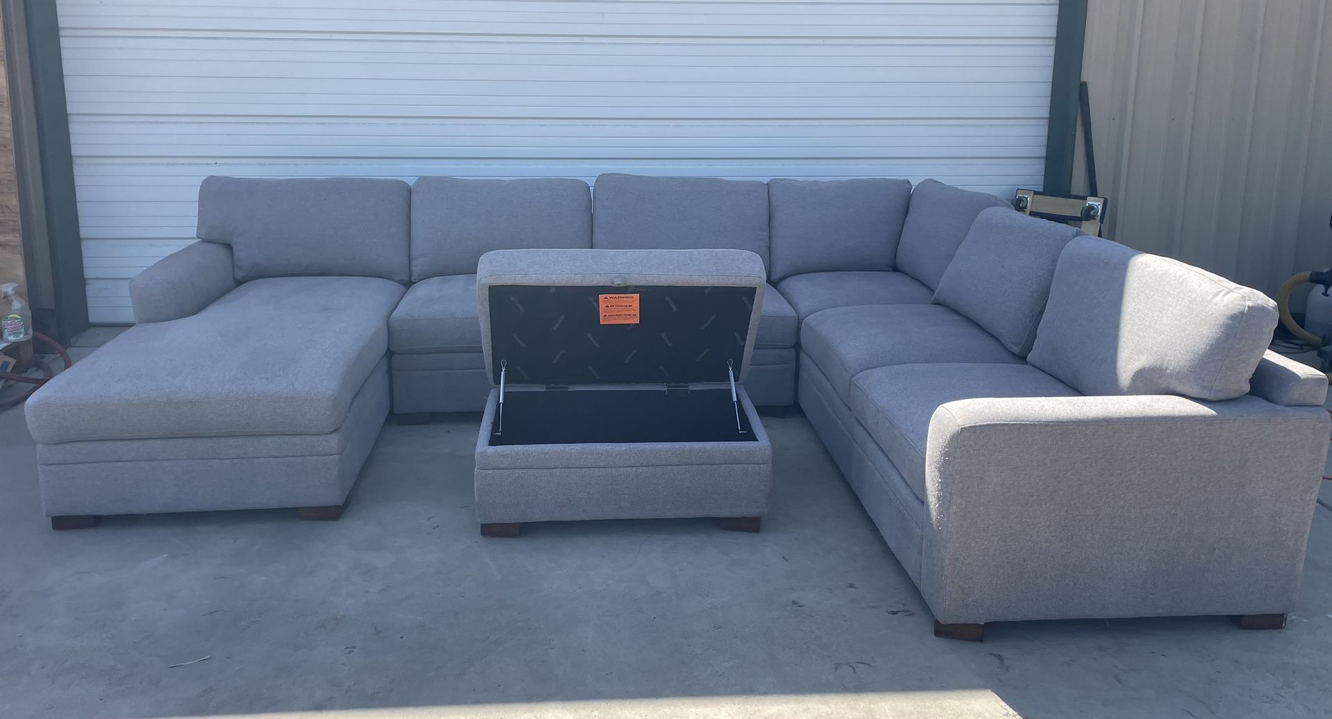 FABRIC SECTIONAL WITH CHAISE AND STORAGE OTTOMAN