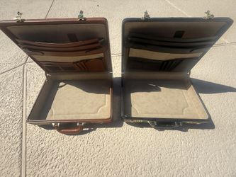 2 great condition used brief cases for sale
